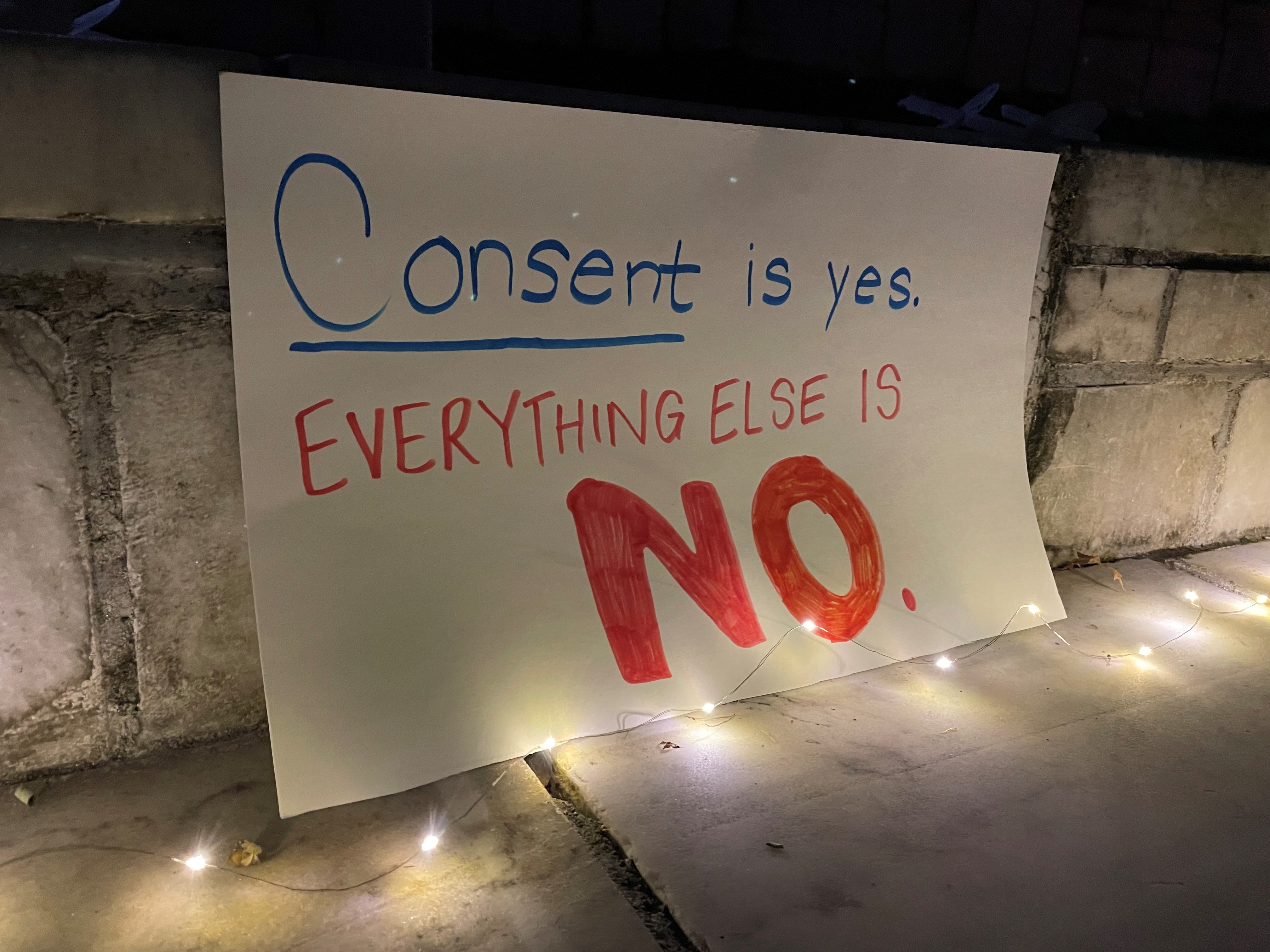 Poster with lights used at Take Back the Night, October 2022.